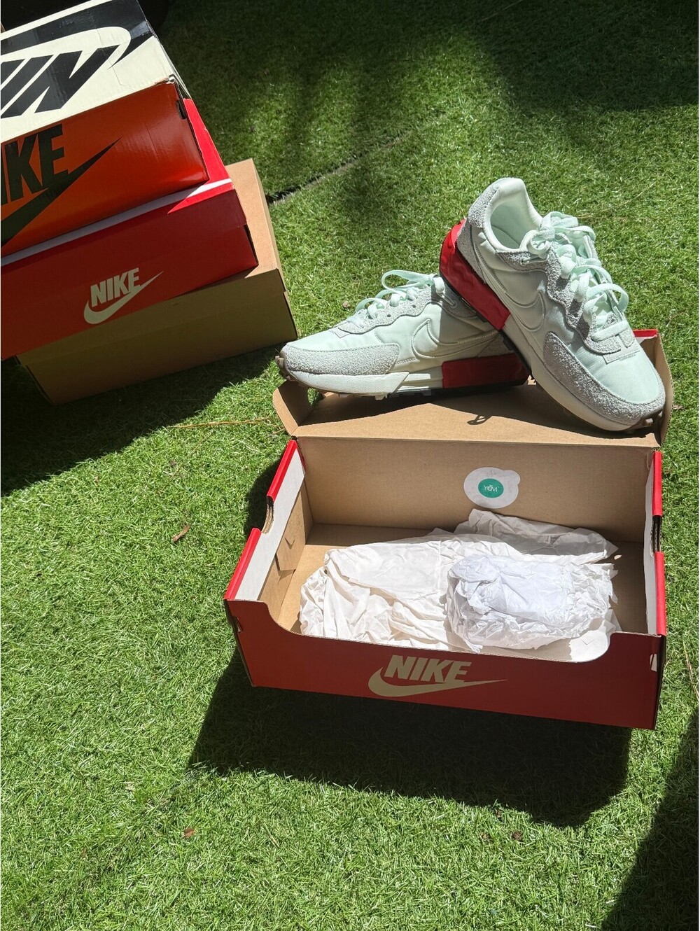 Nike waffle sneakers light mint green with red heel clip
